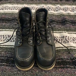 Red Wings boots, men’s but worn by lady.